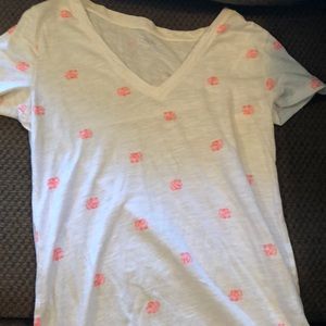 White tee shirt with pink elephants